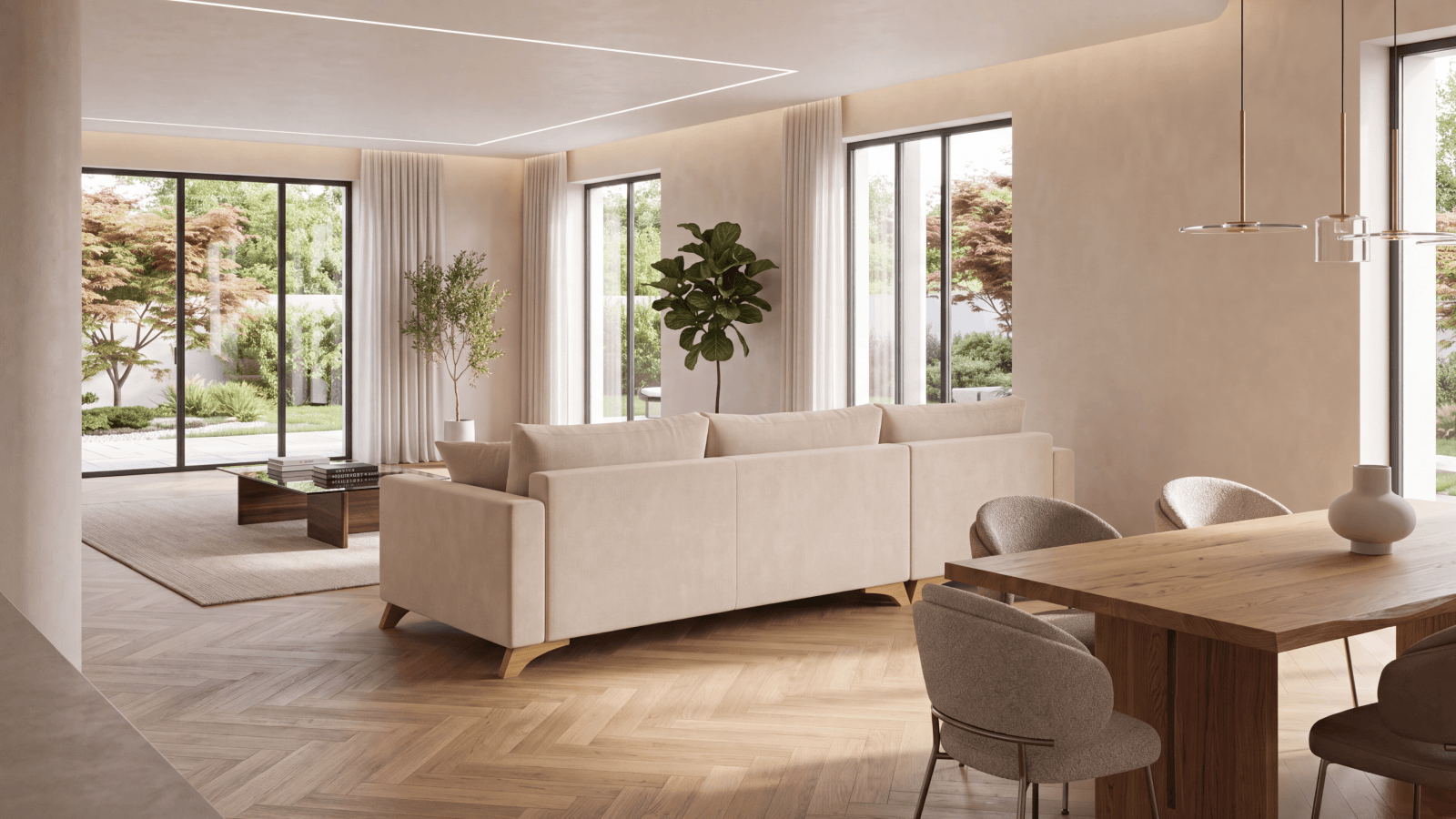 Salón-comedor abierto con el sofá exento separando las dos zonas